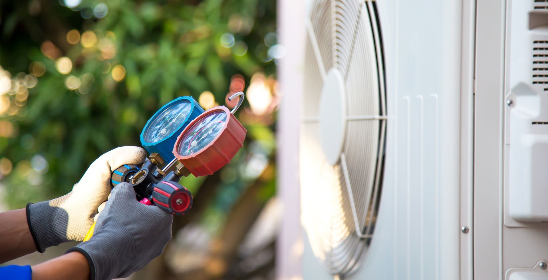 HVAC gauges measuring a residential air conditioning system